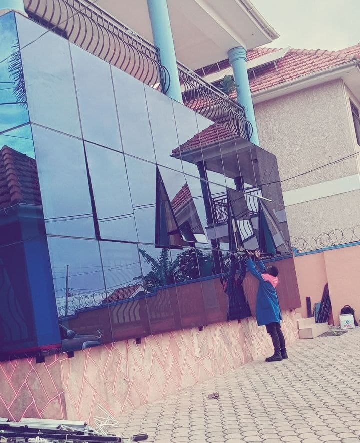 Glass curtain wall installation by Luxury Aluminium