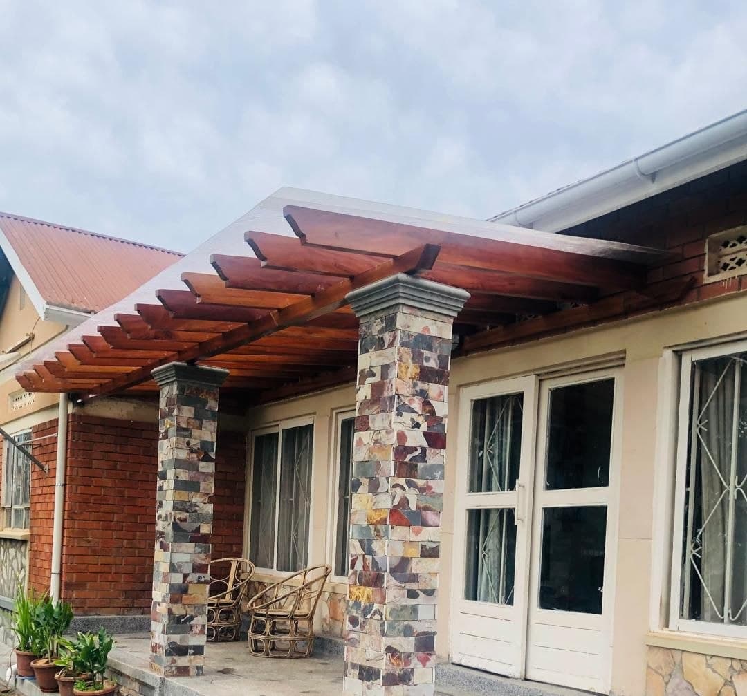 Wooden pergola installation by Luxury Aluminium